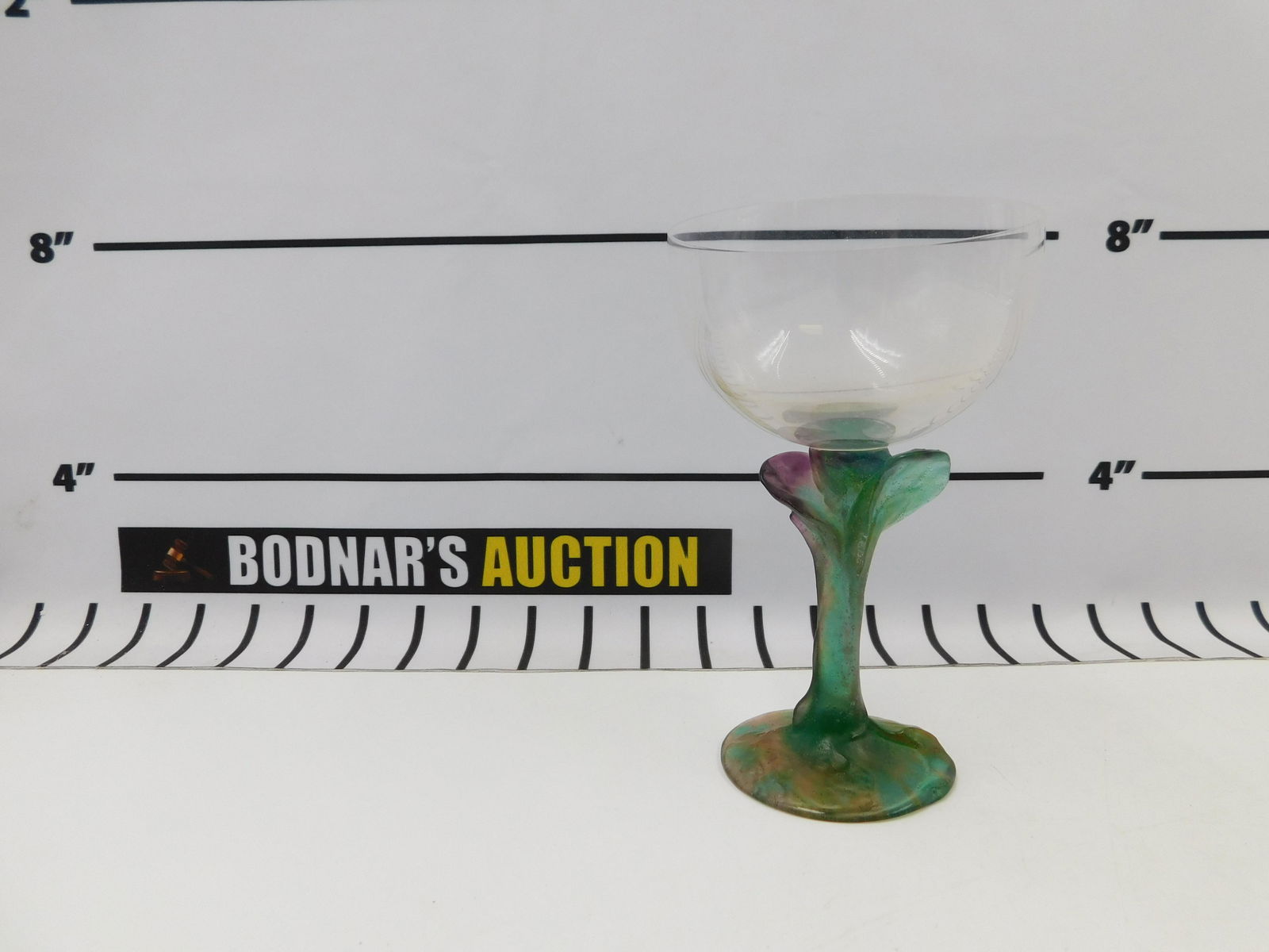 Daum Nancy Art Glass Stem Glass: Daum Nancy Art Glass stem glass signed Daum France. Measures approx. 6.5" tall, 4.25 diameter. All invoices must be paid within 24 hours of the sale. All items are shipped with Liveauctioneers Live Sh