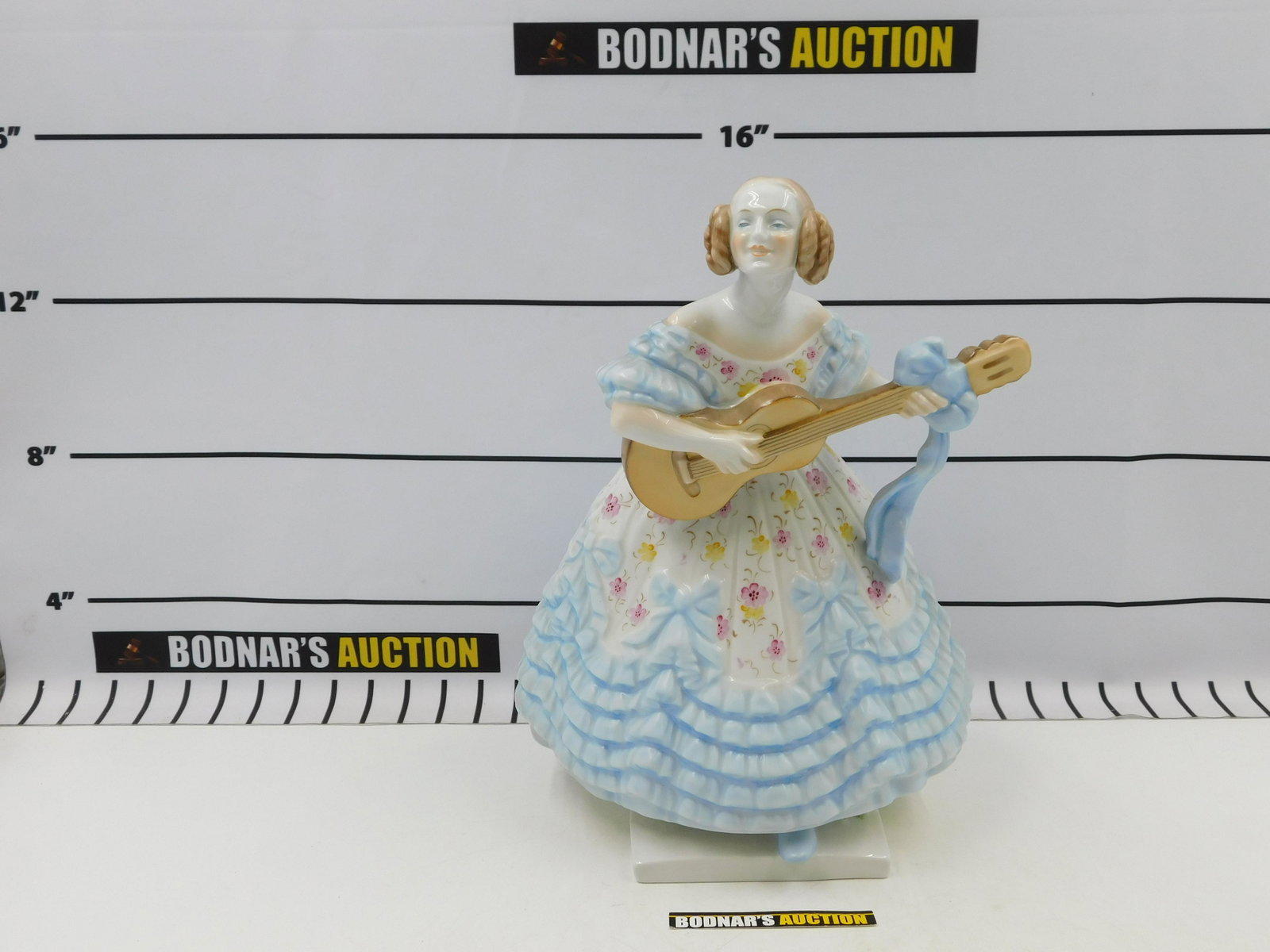 Herend Hungarian Girl with Guitar: Oversized Herend Figurine, Girl Playing Guitar. Hand painted, Made in Hungary. Measures approx. 14.5" tall, 10" wide. All invoices must be paid within 24 hours of the sale. All items are shipped with 