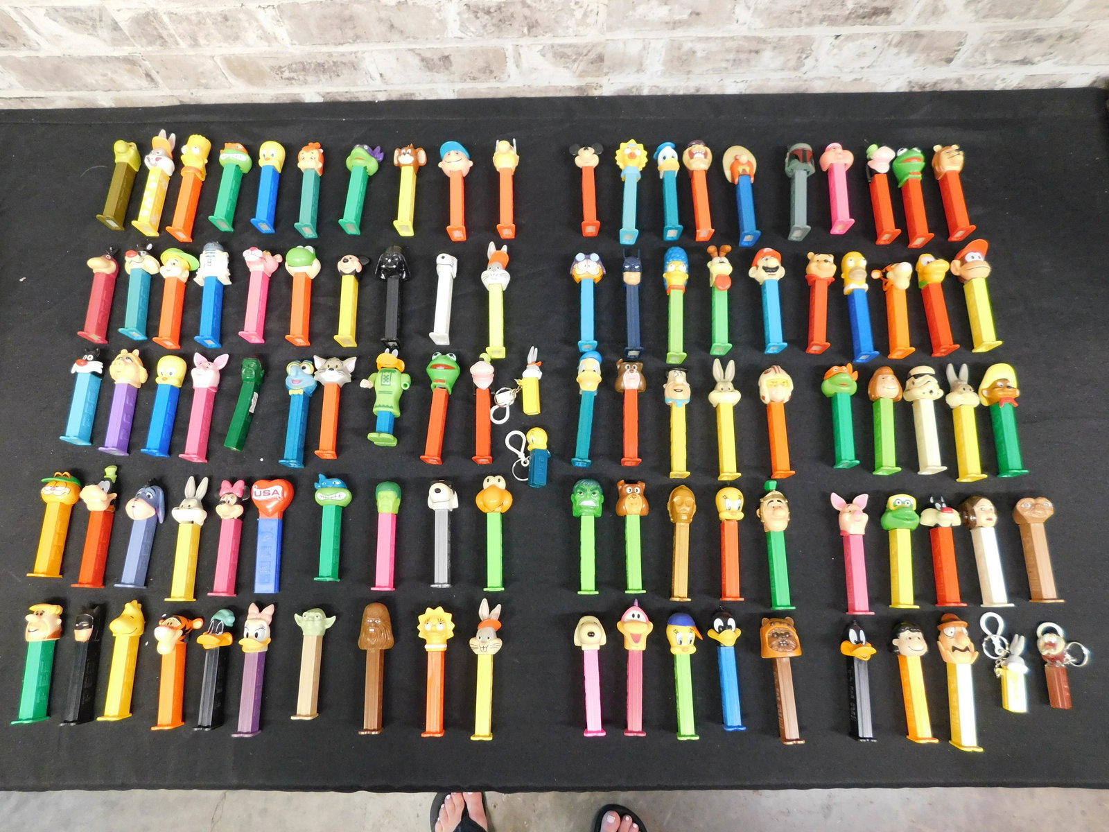 Lot of Loose Pez: Lot of Loose Pez. Includes The Simpsons, Disney, Muppets, Hulk, Batman, Donkey Kong, TMNT, Flintstones, and More. Please read the terms and conditions. This sale will be broadcast live on sale day wit