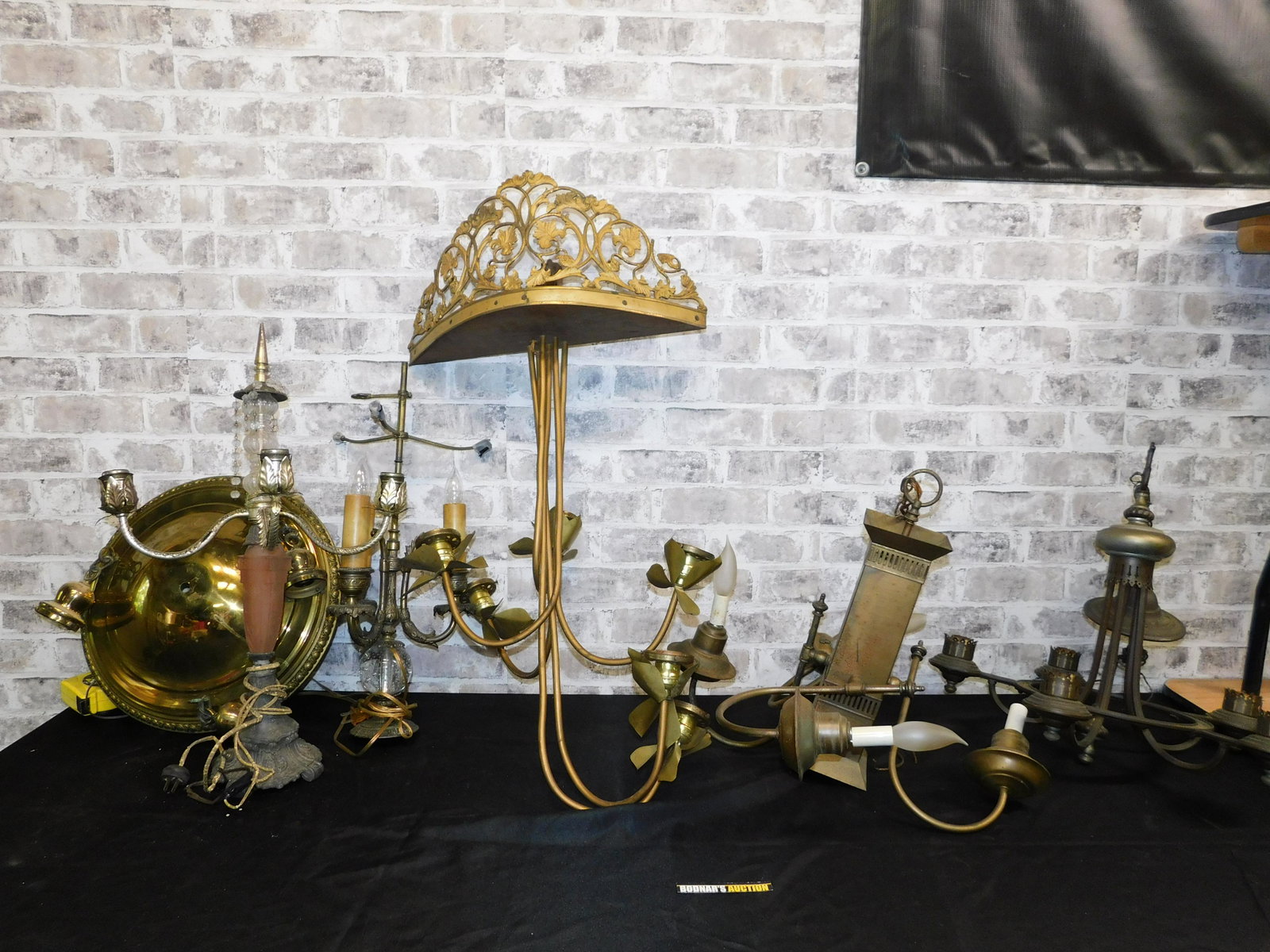 Group Lot of Mixed Metal Lighting: Group Lot of Mixed Metal Lighting. Many Pieces are AS-IS. Largest one measures 36" tall x 19" wide. Please read the terms and conditions. This sale will be broadcast live on sale day with full descrip