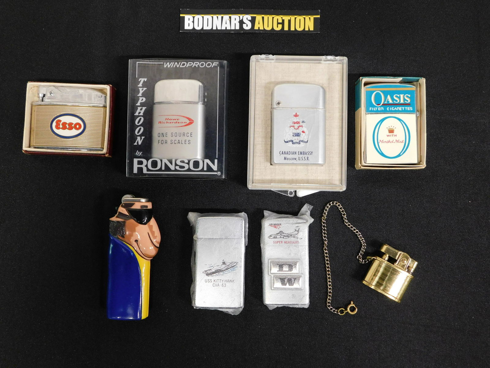 Lot of Vintage Lighters: Lot of Vintage Lighters including Joe Camel, Zippos and More. Please read the terms and conditions. This sale will be broadcast live on sale day with full descriptions of each lot being sold. All item