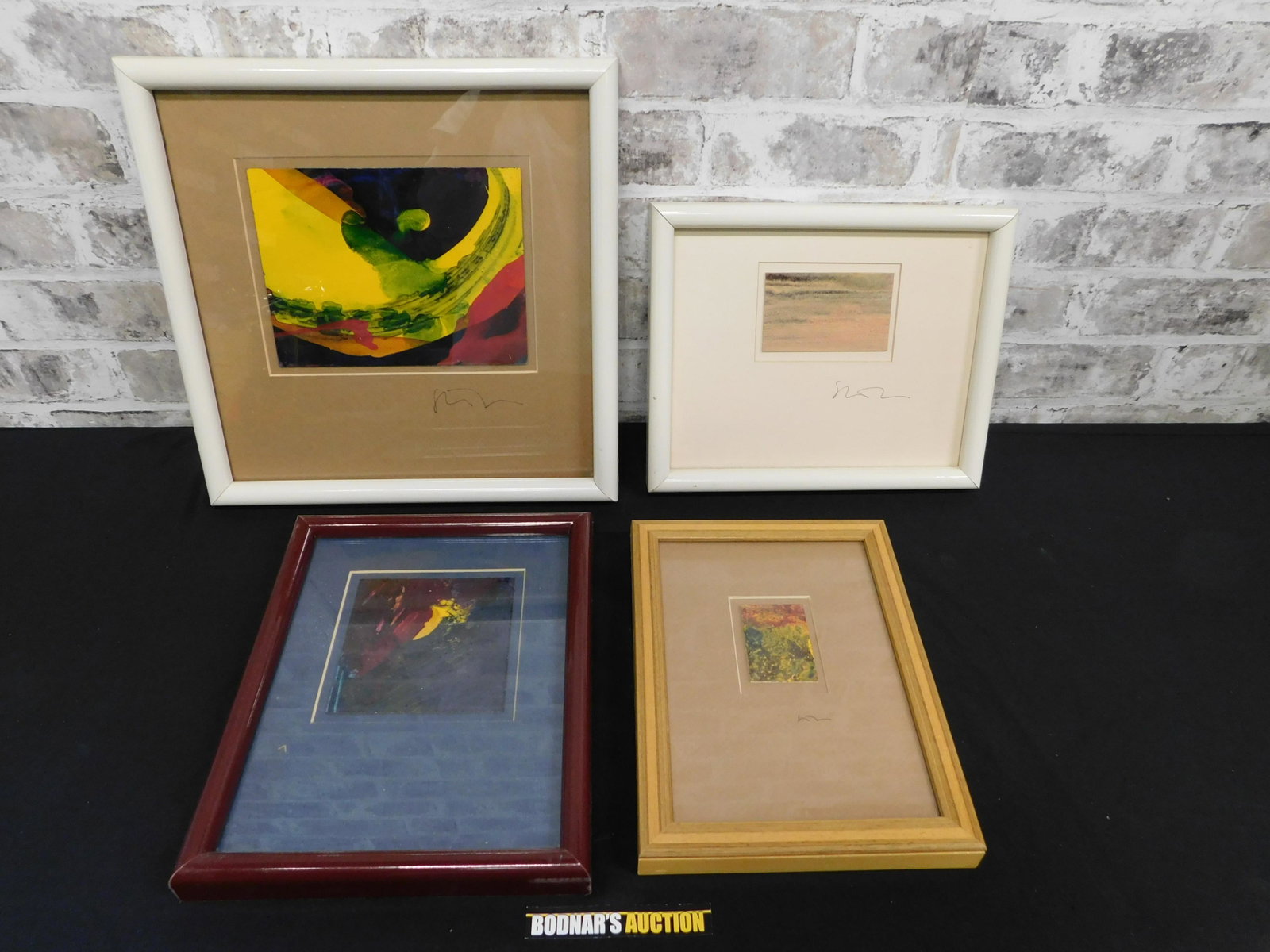 Lot of 4 Framed Abstracts Paintings: Lot of 4 Framed Abstracts Paintings. Artist Signed - Possibly Steve Roday. Frames measure between 10" - 13" tall x 7.75" - 13" wide. Please read the terms and conditions. This sale will be broadcast l