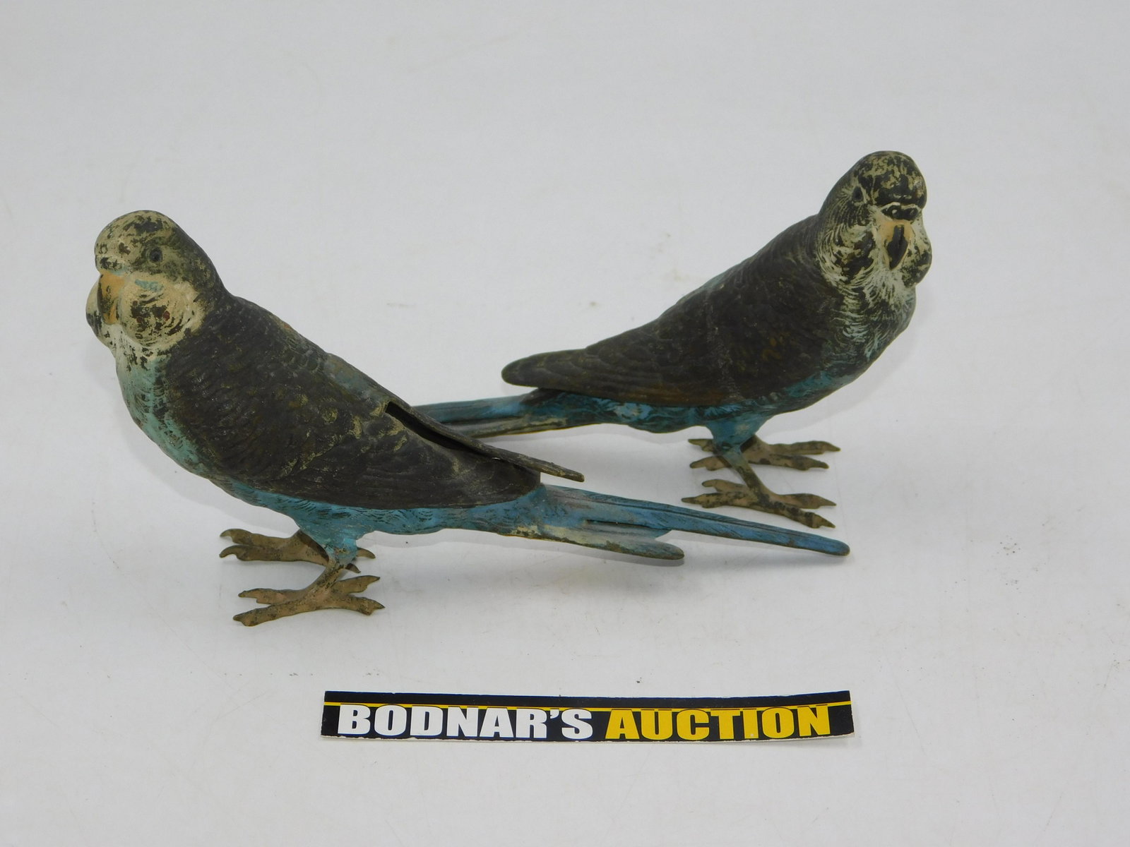 Pair of Cold Painted Bronze Parakeet Figurines: Pair of Cold Painted Bronze Parakeet Figurines. Circa 1920-1950. Measures 3.5" tall x 6" wide. All invoices must be paid within 24 hours of the sale. If you need your items shipped, we are using Livea