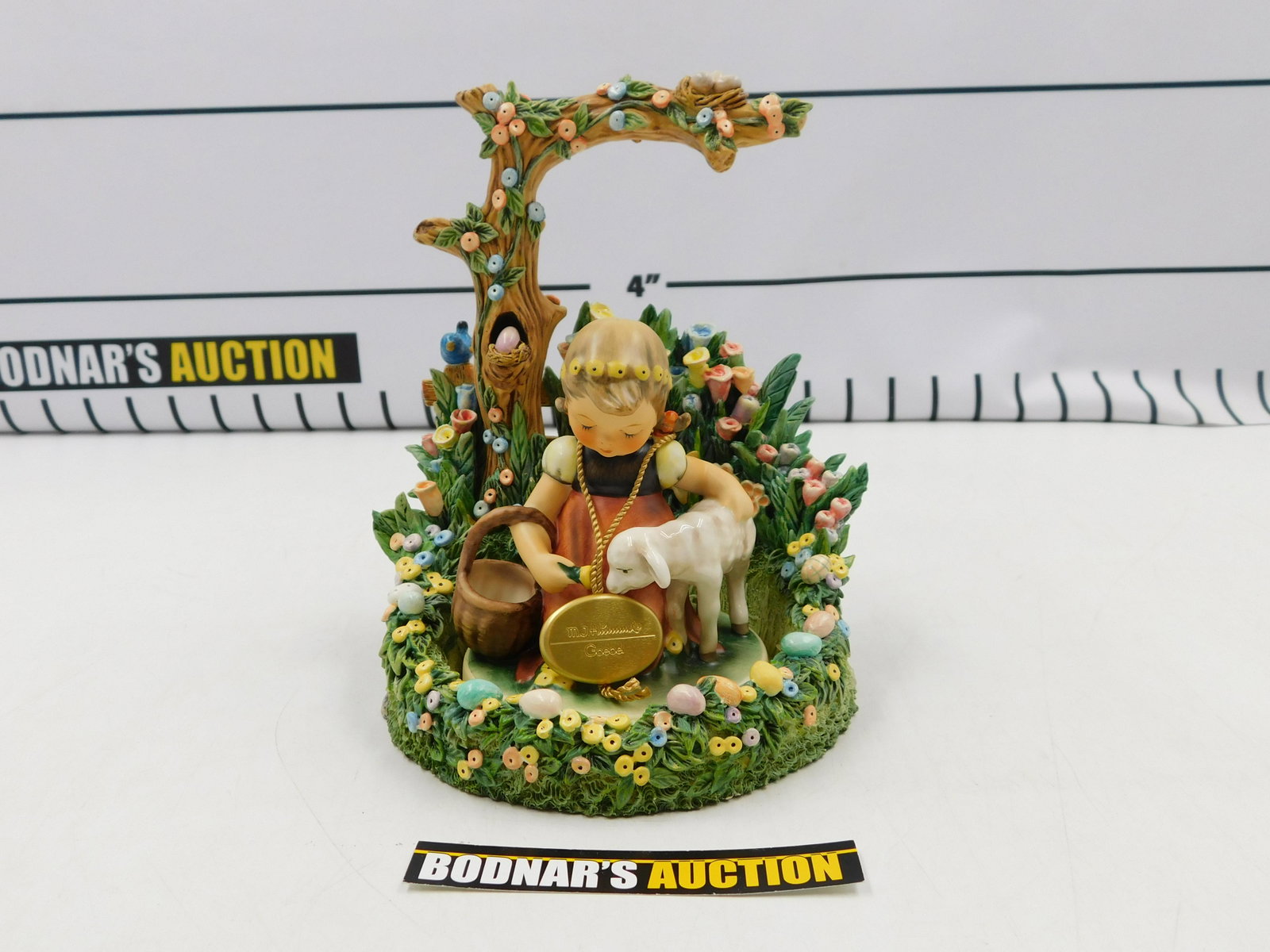 Hummel 2001 Retirement Exclusive Figurine with Base: Hummel 2001 Retirement Exclusive Figurine with Base. Includes "Favorite Pet" measuring 4.5" tall and "Easter Morning" Base measuring 7.5" tall x 6" wide. All invoices must be paid within 24 hours of t
