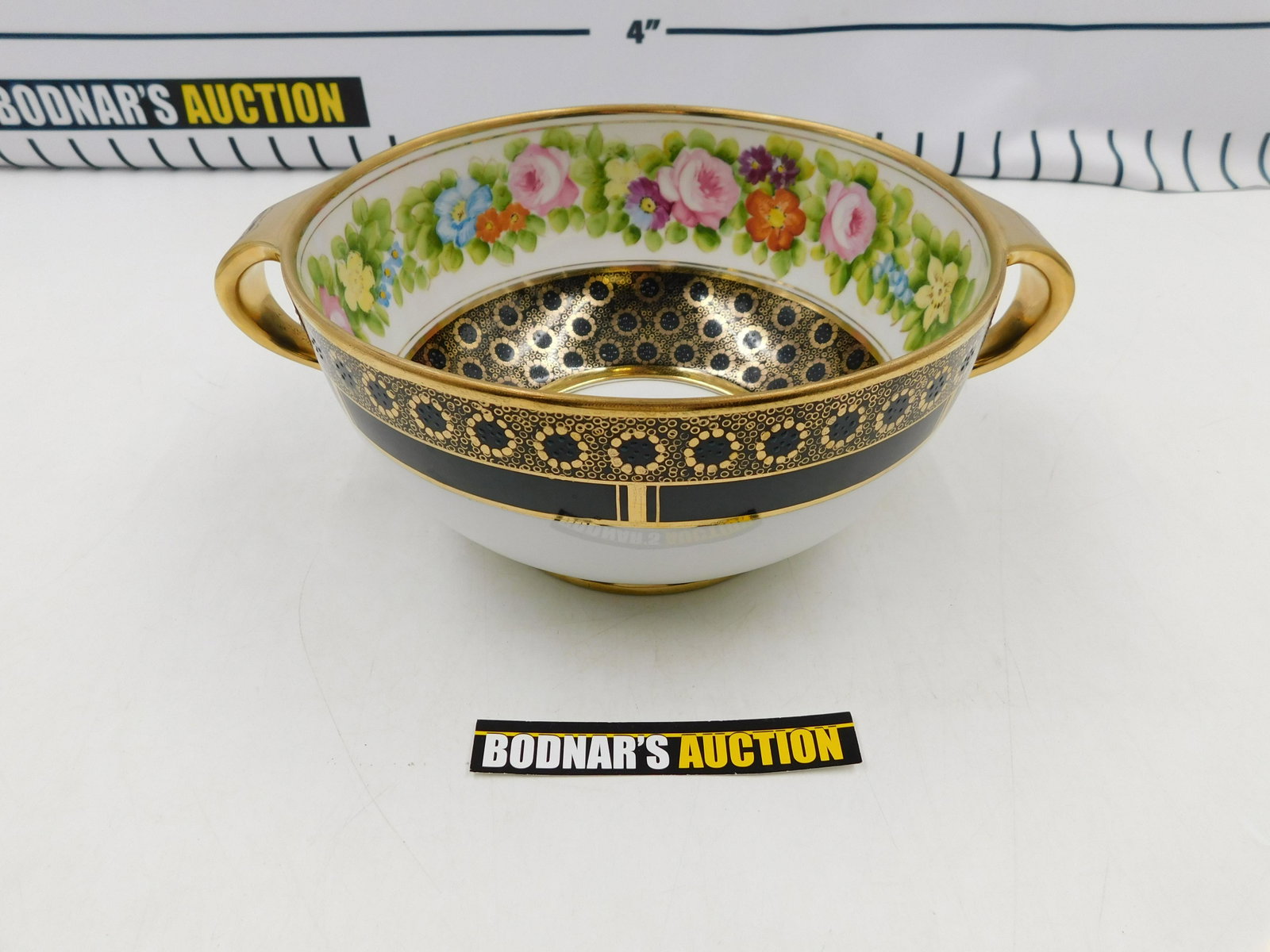 Nippon Hand Painted Floral Bowl: Nippon Hand Painted Floral Bowl with Double Handles. Measures 11" wide x 4.25" tall. All invoices must be paid within 24 hours of the sale. If you need your items shipped, we are using Liveauctioneers