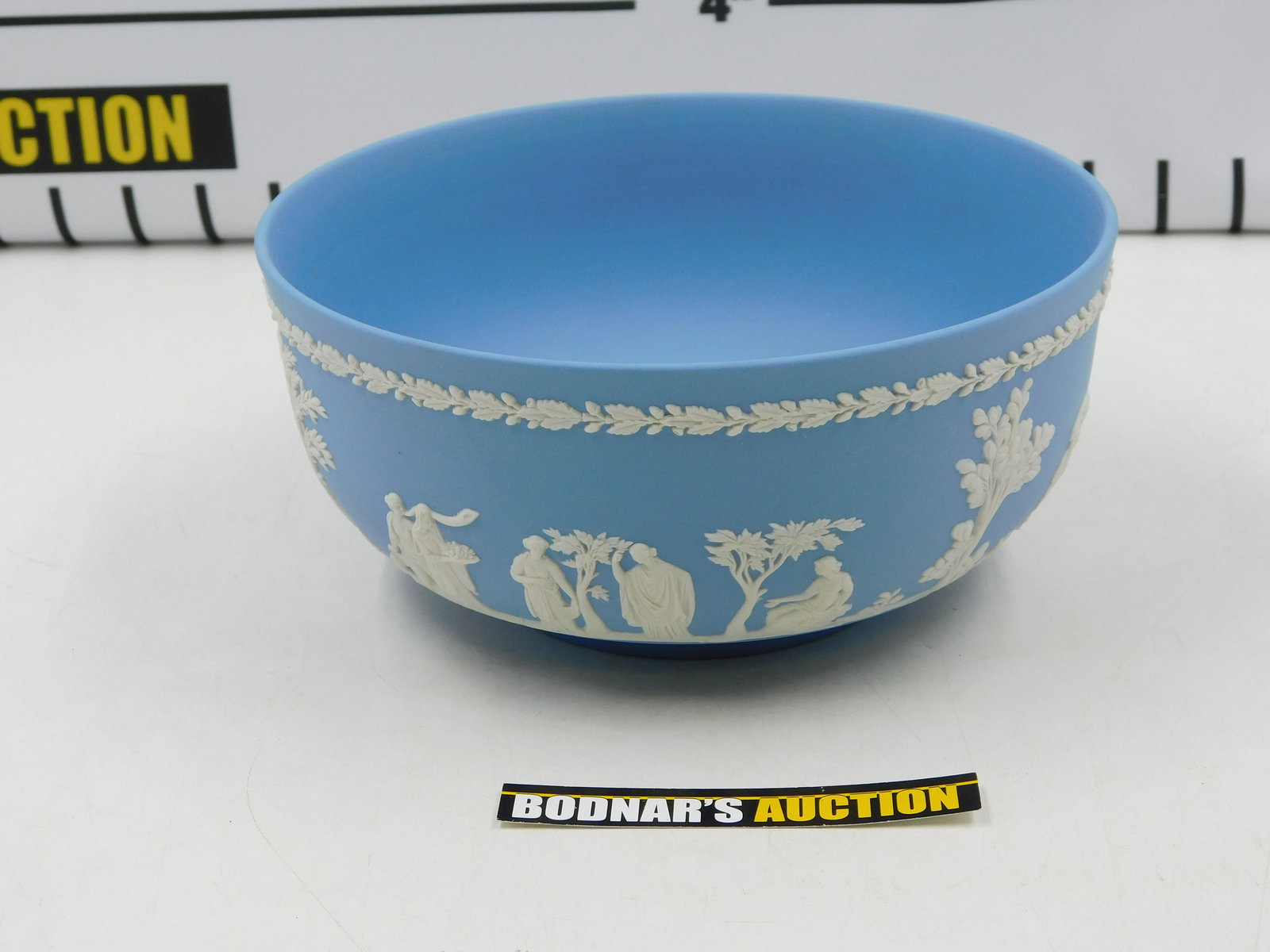 Wedgwood Blue Jasperware Center Bowl: Wedgwood Blue Jasperware Center Bowl. Measures 8" diameter. All invoices must be paid within 24 hours of the sale. If you need your items shipped, we are using Liveauctioneers Live Ship. They will pac