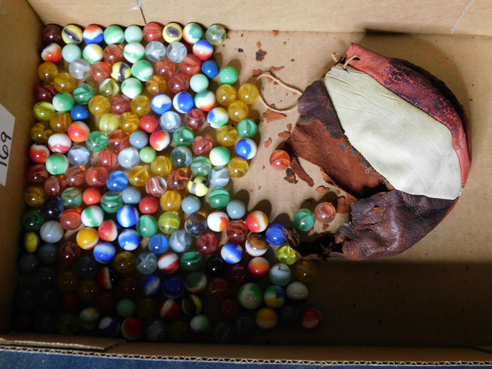 Lot of Marbles: Lot of Marbles. Includes Bag - Bag in Rough condition. All invoices must be paid within 24 hours of the sale. All items are shipped USPS or UPS and will be billed separately. A $12 handling fee is add