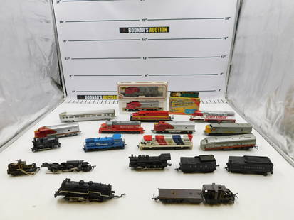 Lot of 15 HO Scale Engines with Extras: Lot of 15 HO Scale Engines. Various Makers including Bachmann, AHM. Also includes Tyco Passenger Car and Train Parts. All invoices must be paid within 24 hours of the sale. No trains have been tested