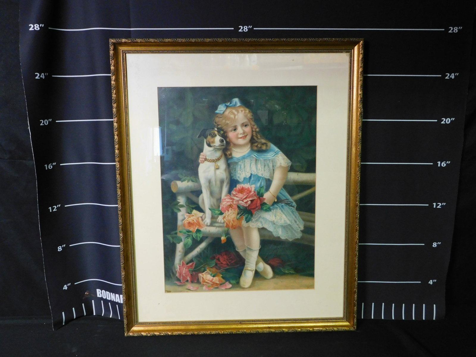 Victorian Print of Girl with Dog: Victorian print on canvas depicting a girl with a dog sitting on a birch tree bench. Measures 27 inches tall by 22 inches long. All invoices must be paid within 24 hours of the sale. This auction is L