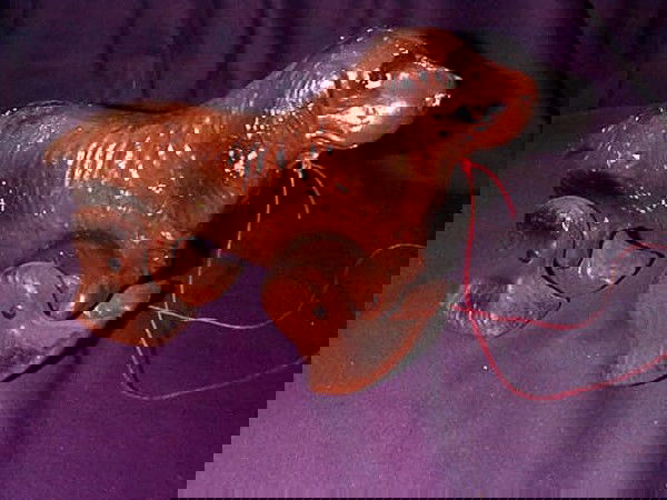 Composition Cocker Spaniel dog pull toy. Measures: Composition Cocker Spaniel dog pull toy. Measures 11 1/2" long. Buyer to pay $15.00 shipping and handling to be sent US priority mail with delivery confirmation. Buyer must pay actual insurance cost i