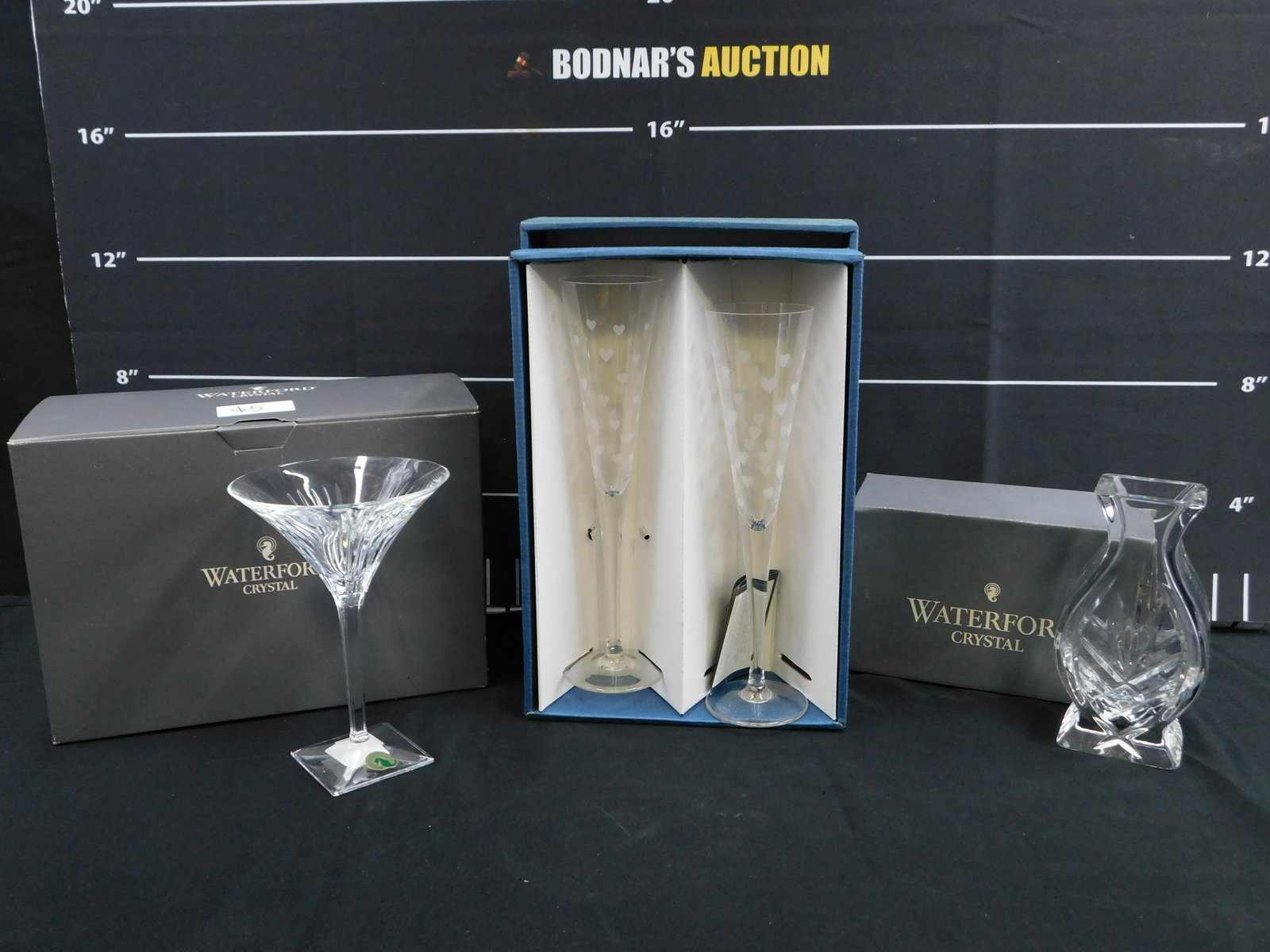 Lot of Waterford and Waterford Marquis: Lot of Waterford and Waterford Marquis including Waterford Pair of Clarion Martini Glasses - New in Box, Waterford Athens 7" Vase with Box, and Marquis Pair of Mini Heart Flutes in Box. All invoices m