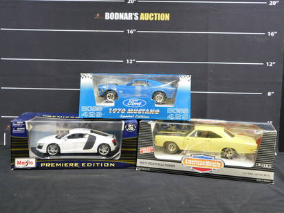 Lot of 3 Diecast Cars 1:18 Scale: Lot of 3 Diecast Cars 1:18 Scale including American Muscle 1969 Road Runner, Ertl Ford 1970 Mustang Special Edition, and Maisto Audi R8 - Premiere Edition. All come in original boxes. Please read the