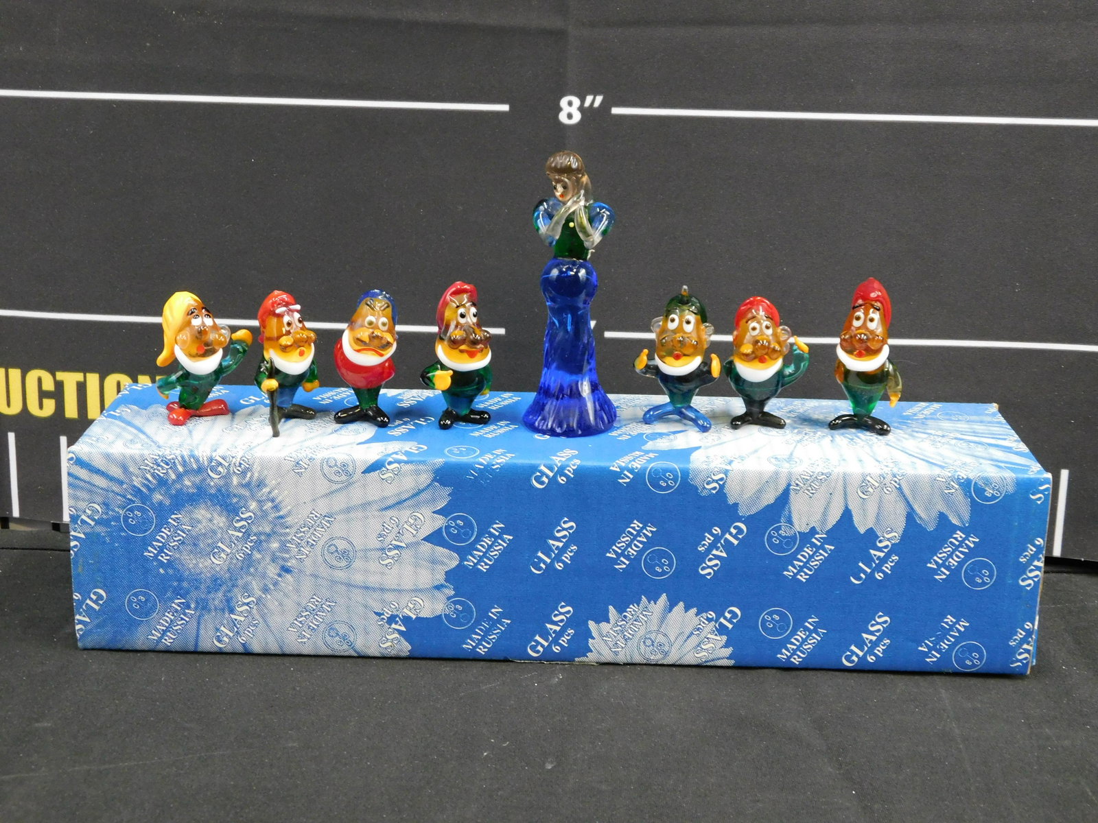 Snow White and the Seven Dwarfs Glass Figurines: Snow White and the Seven Dwarfs Glass Figurines. Dwarfs measure 2" - 2.5" tall and Snow White measures 4.5" tall. Please read the terms and conditions. This sale will be broadcast live on sale day wit