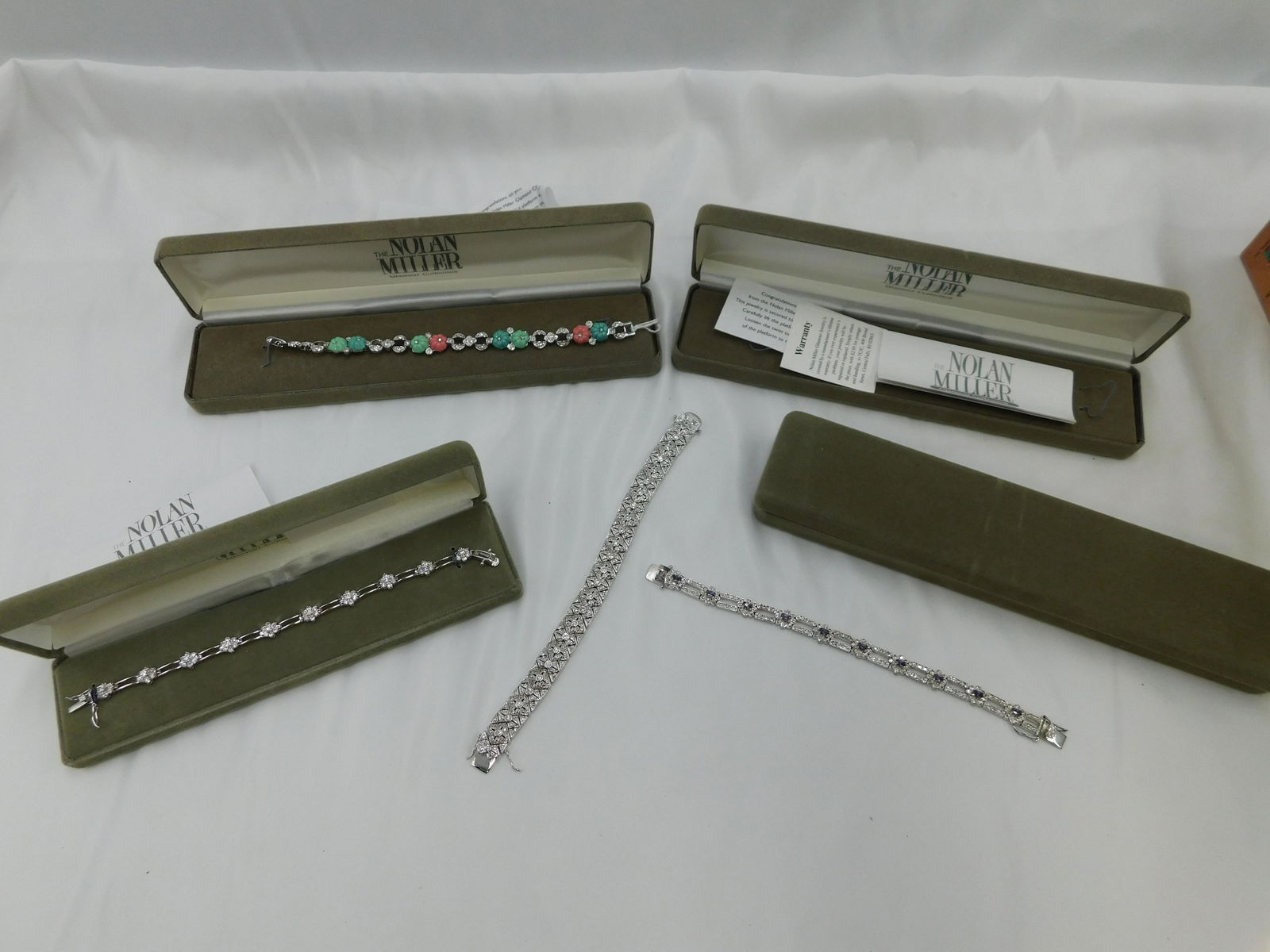 Lot of 4 Nolan Miller Silver Tone and Rhinestone Bracelets (1 of 6)