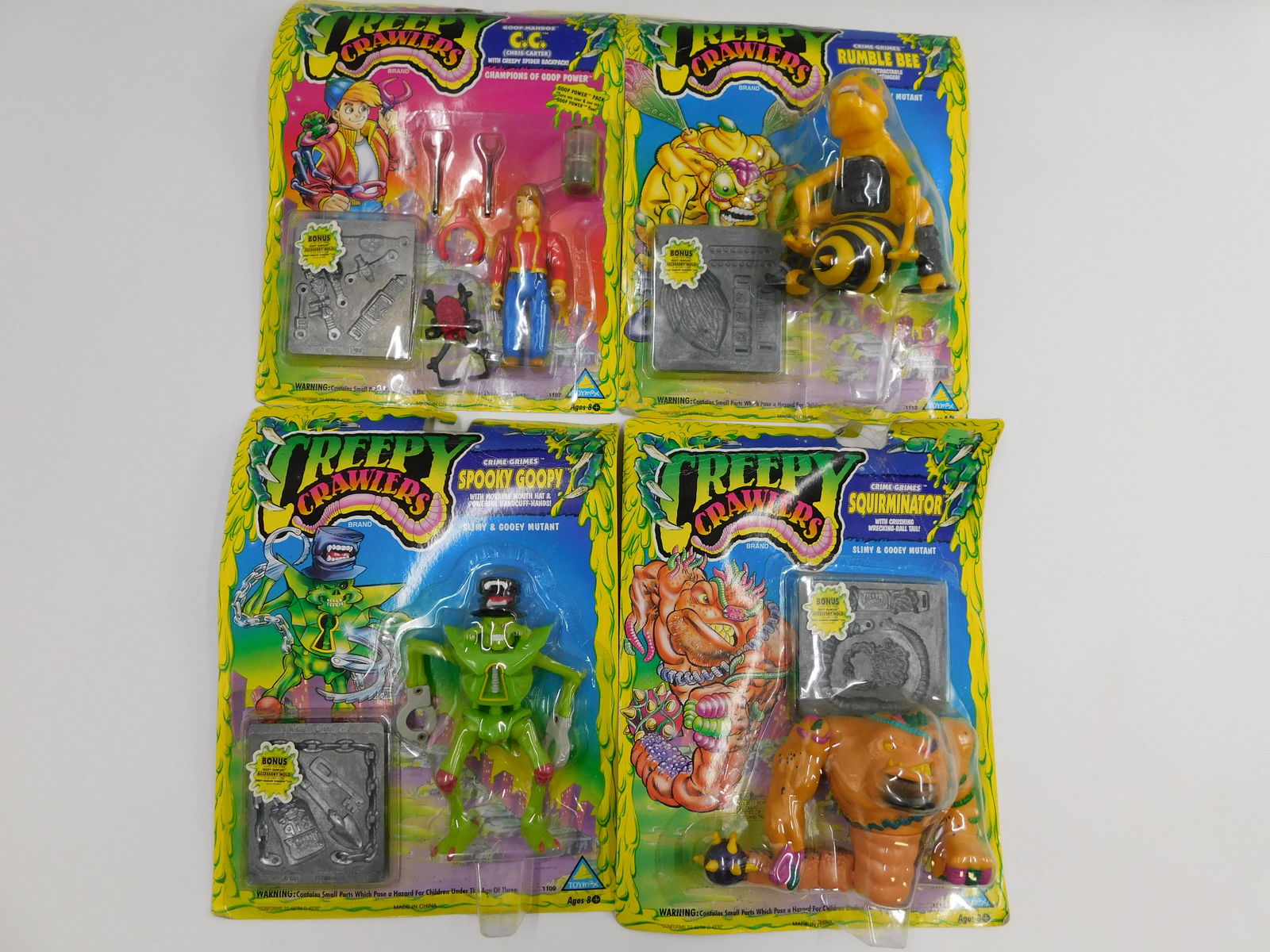 Lot of 4 Creepy Crawlers by Toymax: Lot of 4 Creepy Crawlers by Toymax including Squirminator blister off card in areas, Spooky Goopy, Rumble Bee, and CC Chris Carter all near mint on card. All invoices must be paid within 24 hours of t