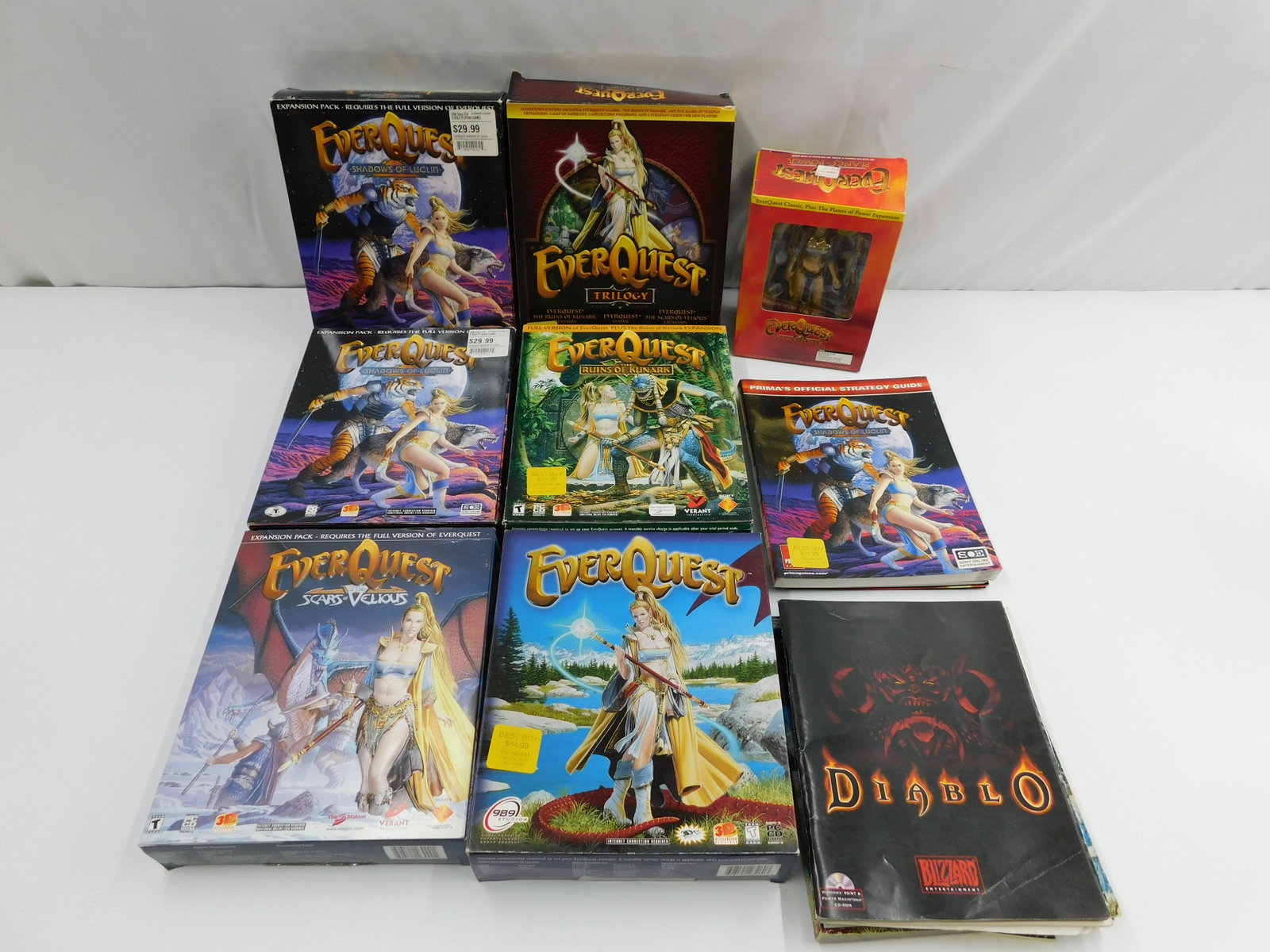 Lot of Ever Quest PC Games: Lot of Ever Quest PC Games and paperwork including Shadows of Luclin, Scars of Vellous, Trilogy, Ruins of Kunark, and more. We are not sure if each gam is complete but there is paperwork in each box. 