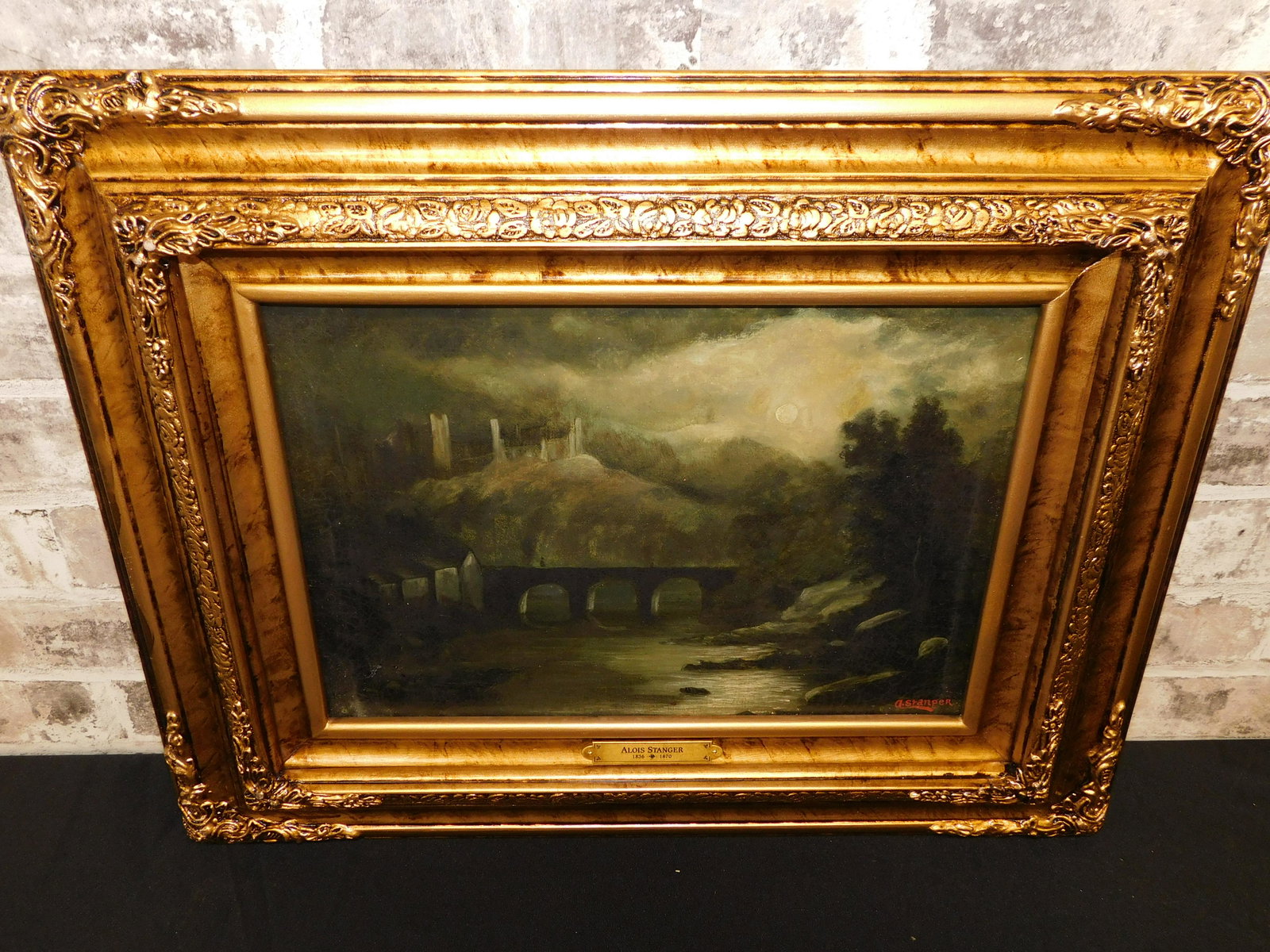 19th Century Oil on Canvas - Castle with Full Moon: 19th Century Oil on Canvas by Alois Stanger (1836-1870). Depicting Evening Full Moon over a Castle in the Hills with a River and Bridge. Has some crazing. Signed lower right. Measures 17" tall x 21" w