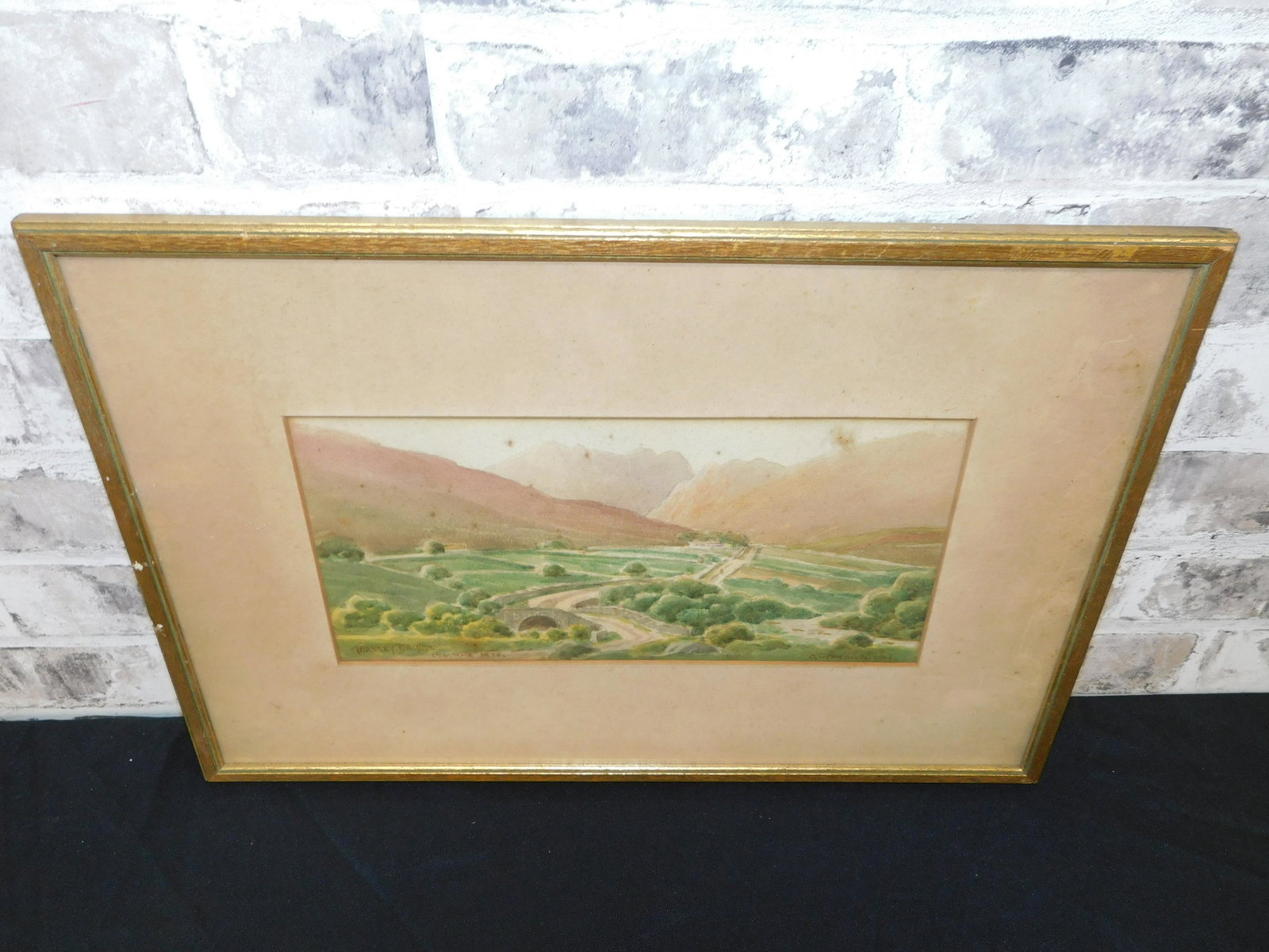 Watercolor on Board - Trassey Bridge: Watercolor on Board by GW Morrison. Depicting the Trassey Bridge in the Mourne Mountains. Signed lower right. Some foxing to board. Measures 13" tall x 18.25" wide. All invoices must be paid within 24