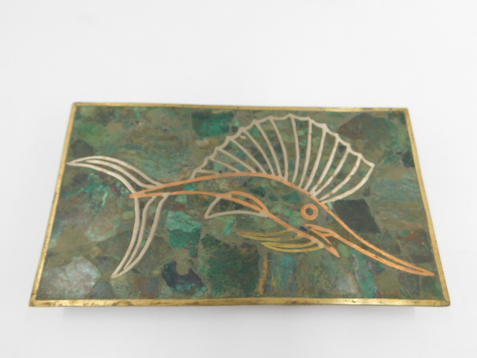 Mid Century Modern Mixed Metal Box: Mid Century Modern Mixed Metal Box. Has teak wood insert and Marlin on lid. Marked Mexico. Measures 1" tall x 7.75" wide. All invoices must be paid within 24 hours of the sale. Shipping options are th