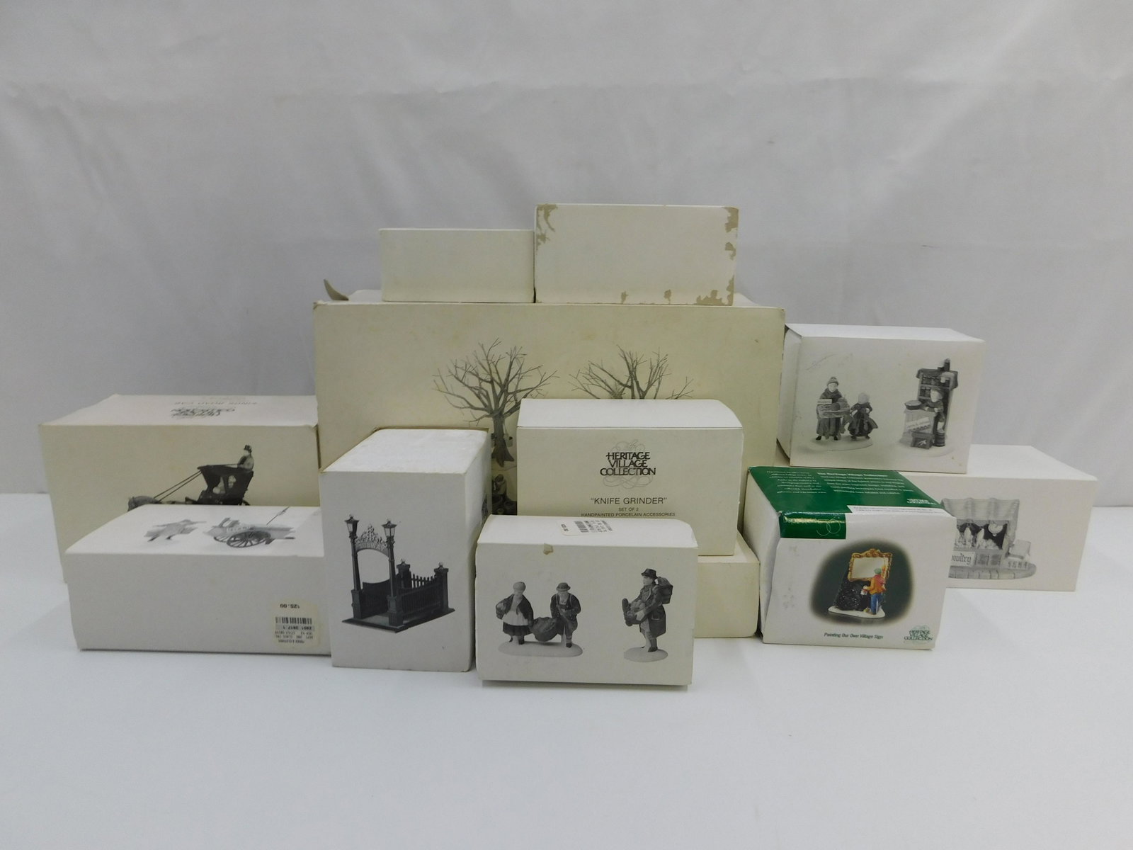 Lot of 12 Dept 56 Accessories: Lot of 12 Dept 56 Accessories including Tapping the Maples, Kings Road Cab, Town Tinker, Christmas Bazaar. Woolens and Preserves, Knife Grinder, City Subway Entrance, Village St. Peddlers, Buying Bake