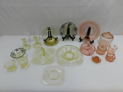 Large Lot of Depression Glass: Large Lot of Depression Glass including Yellow Silver Overlay Condiment Bowl with Underplate, 3 Piece Yellow Console Set, Yellow Cookie Plate, Pink Biscuit Jar, Pink Covered Divided Dish, Pink Measuri