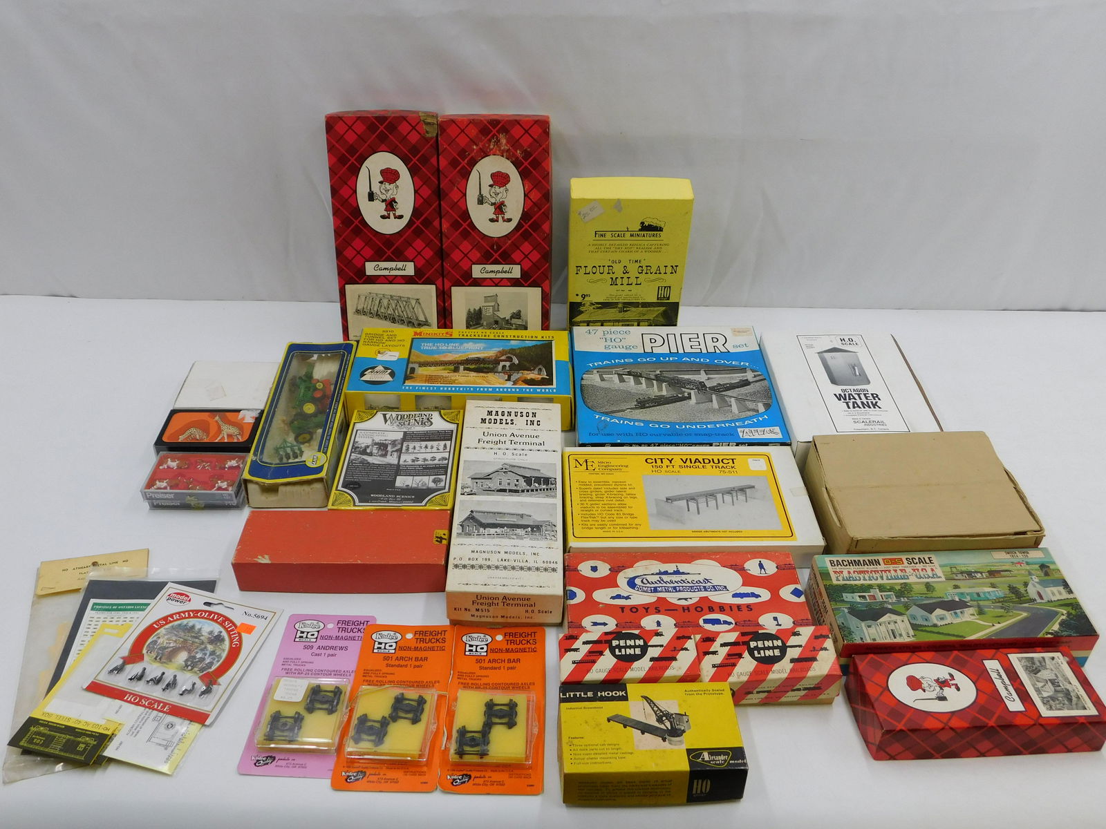 Large Lot of HO Train Accessories: Large Lot of HO Scale Accessories including Woodland Scenes Two Trees - Factory Sealed, Rockman Switch Tower, Campbell Pickens Place, Box with Diecast Boat Parts, Penn Line Tractor Trailers, Octagon W