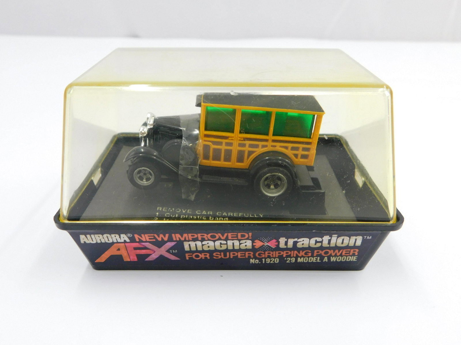 Aurora AFX '29 Model A Woodie Slot Car: Aurora AFX HO Scale Slot Car - Magna Traction. No. 1920 '29 Model A Woodie. Comes in original case. All invoices must be paid within 24 hours of the sale. There are 3 Shipping Options. Please read the
