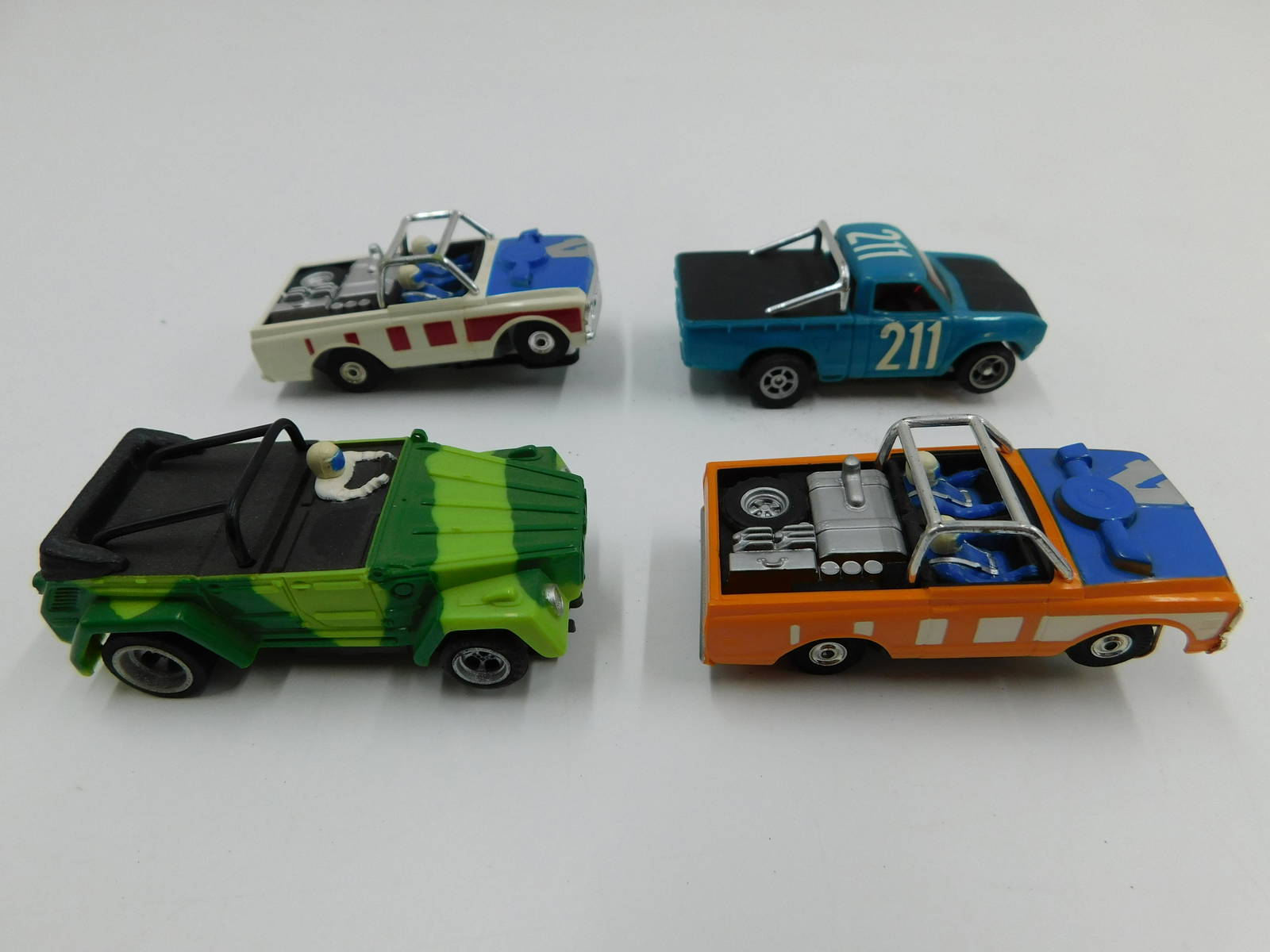 Lot of 4 Aurora HO Scale Slot Cars (0028) on Mar 30, 2023 Bodnar's Auction Sales in NJ