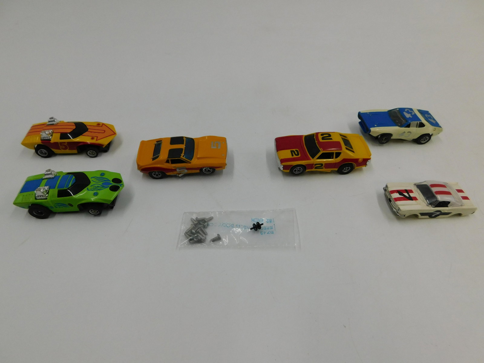 Lot of HO Scale Slot Cars: Lot of HO Scale Slot Cars and Slot Car Shell. The Aurora Cars include AFX "Double Trouble", AFX "Too Much", AFX AMC Javelin - Broken Tire - Tire is included, AFX AMC Matador, and AFX Plymouth Road Run