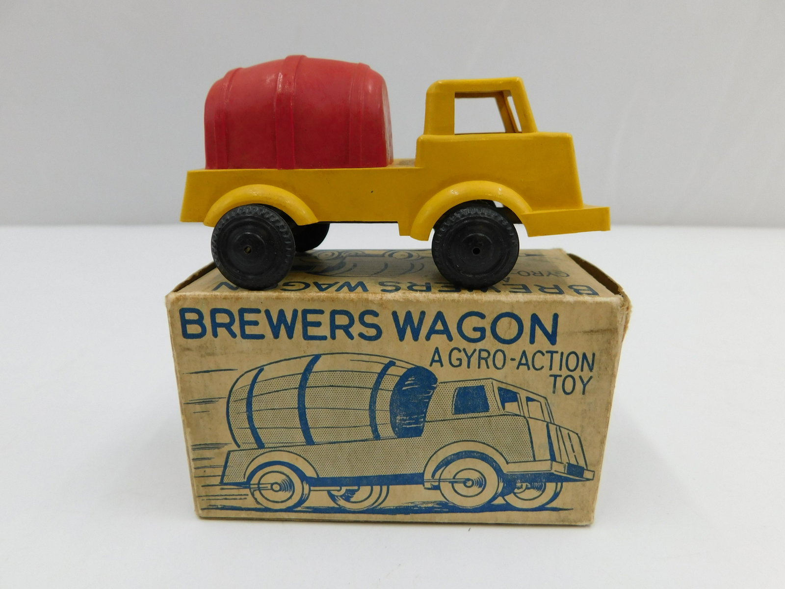 Brewers Wagon Beer Barrel Delivery Truck: Brewers Wagon Gyro-Action Toy. Beer Barrel Delivery Truck. A Bell Product - Made in England. Like new in original box. Measures 3.5" long. All invoices must be paid within 24 hours of the sale. There 
