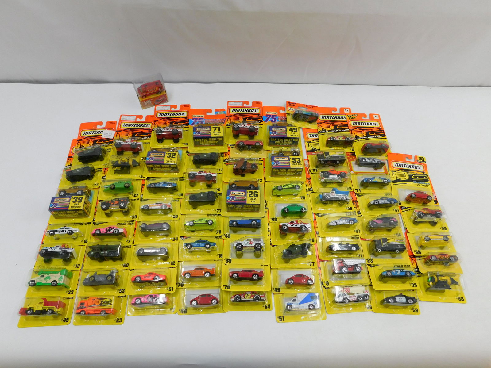 Lot of 70 Matchbox from the 1990's: Lot of 70 Matchbox from the 1990's. All Mint on Card. Includes Superfast, Get in the Action, 75 Car Challenge and More. All invoices must be paid within 24 hours of the sale. There are 3 Shipping Opti