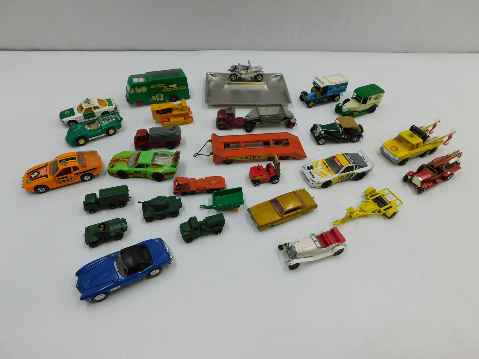 Lot of Matchbox Cars and Lesney Ashtray: Lot of Matchbox Cars - Many Yesteryear Cars. Various Years from Vintage to Newer. Condition range from fair to very good. Includes approx. 20+ Cars and a Lesney Products Ashtray - Missing seat cushion