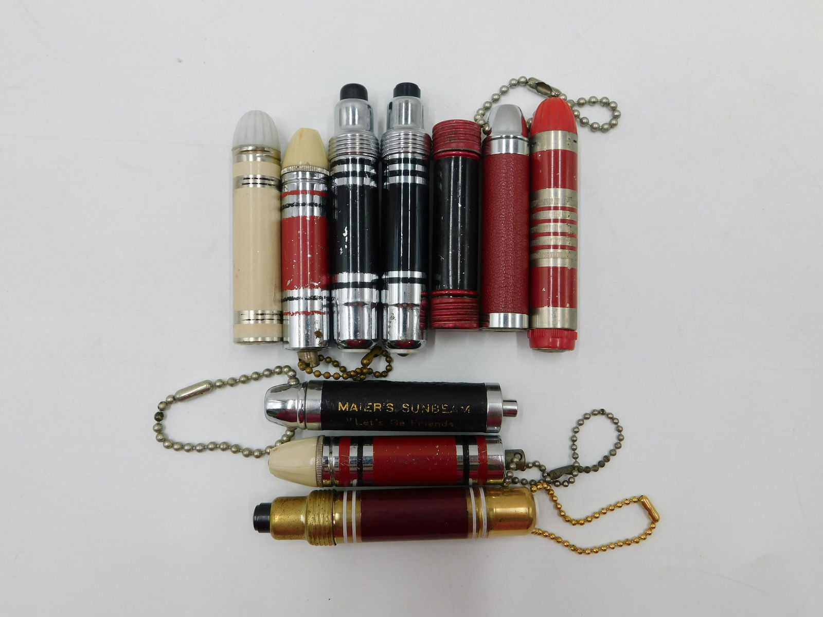 Lot of 10 Pocket and Keychain Flashlights: Lot of 10 Pocket and Keychain Flashlights. Various Makers. In poor to good condition. Largest measures 3". All invoices must be paid within 24 hours of the sale. There are 3 Shipping Options. Please r