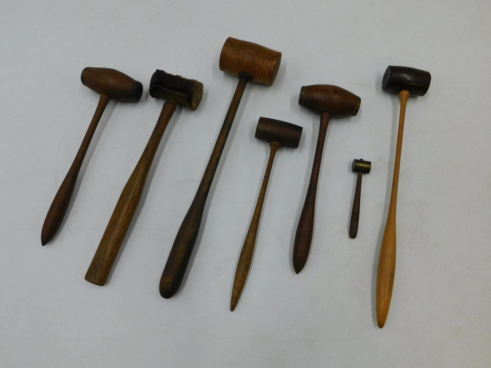 Lot of 7 Miniature Antique Mallets: Lot of 7 Miniature Antique Mallets. Largest measures 10.5" long. All invoices must be paid within 24 hours of the sale. There are 3 Shipping Options. Please read the Terms of Sale and Shipping Options