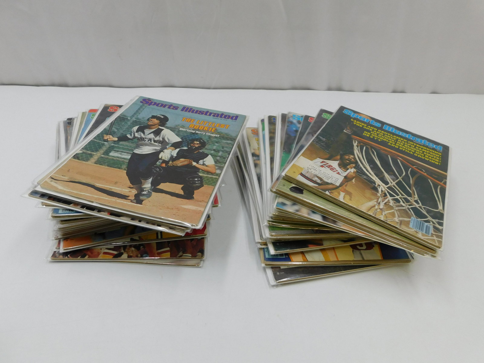 Lot of 43 Sports Illustrated Magazines - 1979: Lot of 43 Sports Illustrated Magazines from 1979 including Magic Johnson and Larry Bird Issues. All items in this sale came from a single owner collection with a 30 day guarantee that the autographs a