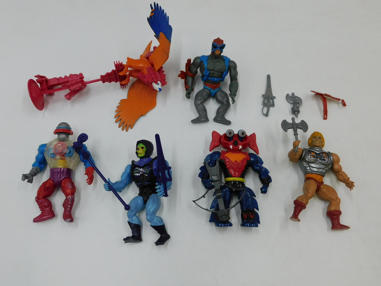 Lot of Vintage He-Man Masters of the Universe Action Figures: Lot of Vintage He-Man Masters of the Universe MOTU Figures including Zoar with Stand, He-Man, Skeletor, Roboto, Mantenna, and Stratos. All appear to be complete or Near Complete. Normal wear consisten