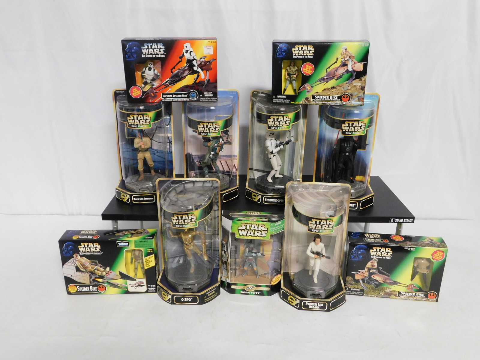 Lot of Mixed Star Wars Figures: Lot of Mixed Star Wars Figures including Speeder Bike with Luke, Speeder Bike with Leia, Imperial Speeder Bike, Boba 300th Figure, (6) Epic Force Figures, and Expanded Universe Speeder Bike. All New i