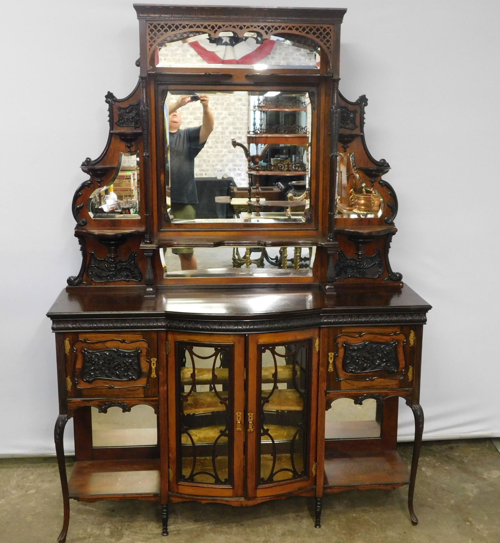 Victorian Carved Rosewood Server: Christopher Pratt Victorian carved rosewood 2 piece buffet/server with mirrored backsplash. Missing 2 column supports on the top shelf but is in otherwise very good condition. Does have top crest just