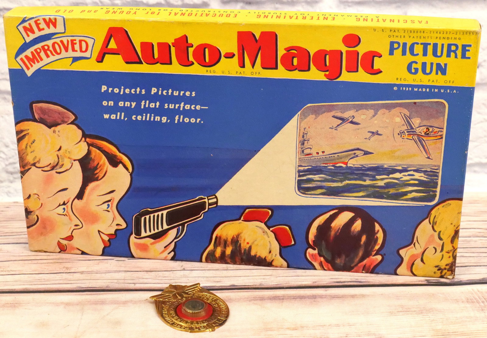 Auto-Magic Picture Gun and Decoder Pin Lot: Lot with Auto-Magic Picture Gun in original box and 1946 Captain Midnight Decoder Badge. All invoices must be paid for within 24 hours. We offer multiple shipping options, please read the terms as the
