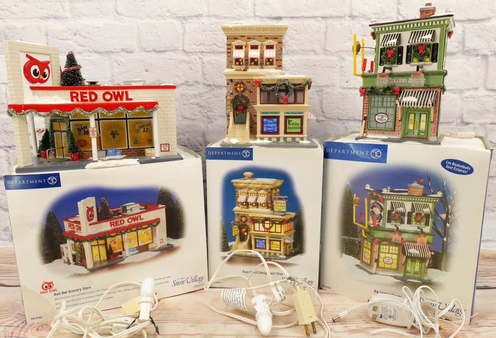 Lot of 3 Department 56 Snow Village Houses: Lot of 3 Department 56 Snow Village Houses including Hope Chest Consignment Shop -chipping on the base, loose bow, missing sign, etc., Red Owl Grocery Store - Minor Chipping on Base - Otherwise appear