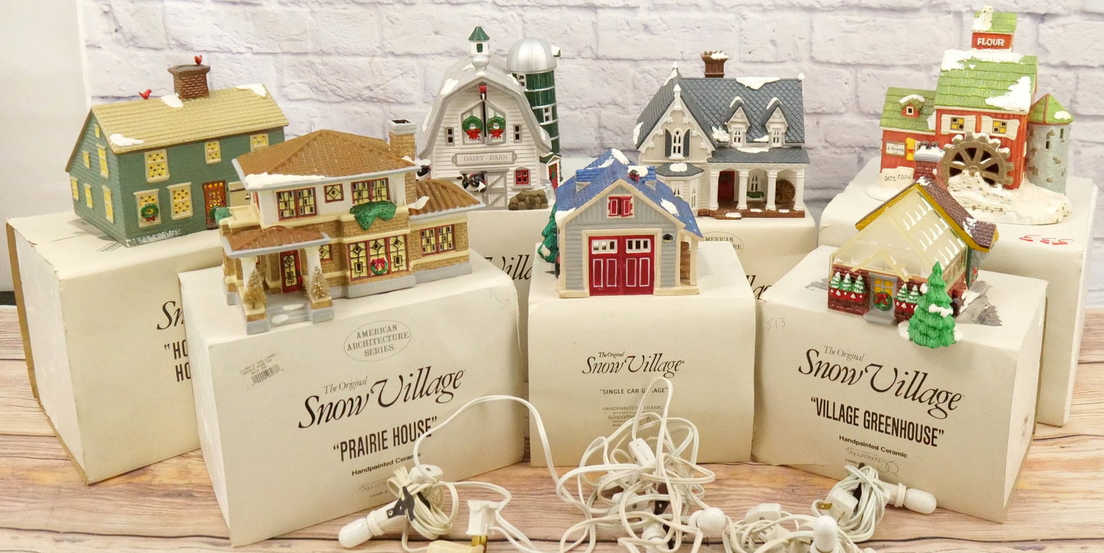 Lot of 7 Department 56 Snow Village Houses: Lot of 7 Department 56 Snow Village Houses including Single Car Garage - Chips on Base, Prairie House, J. Young's Granary, Village Greenhouse, Dairy Barn, Gothic Farmhouse - Chip on base, and Home Swe