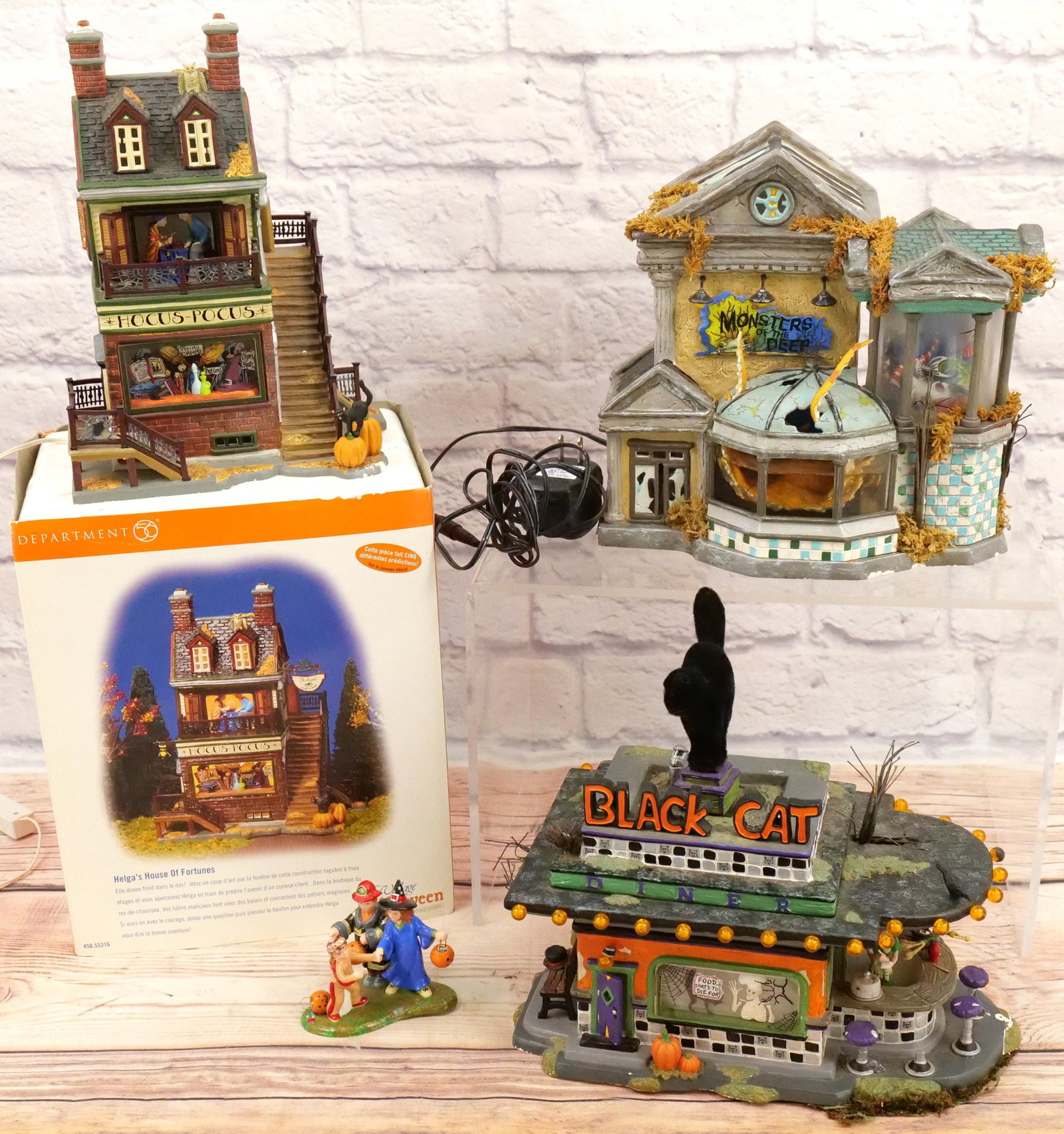 Lot of 3 Department 56 Snow Village Halloween Items: Lot of 3 Department 56 Snow Village Halloween Items including Helga's House of Fortunes - Some chipping on base - No Cord, Monsters of the Deep - No Box - Lights Up - No Movement - Chipping on Base, a