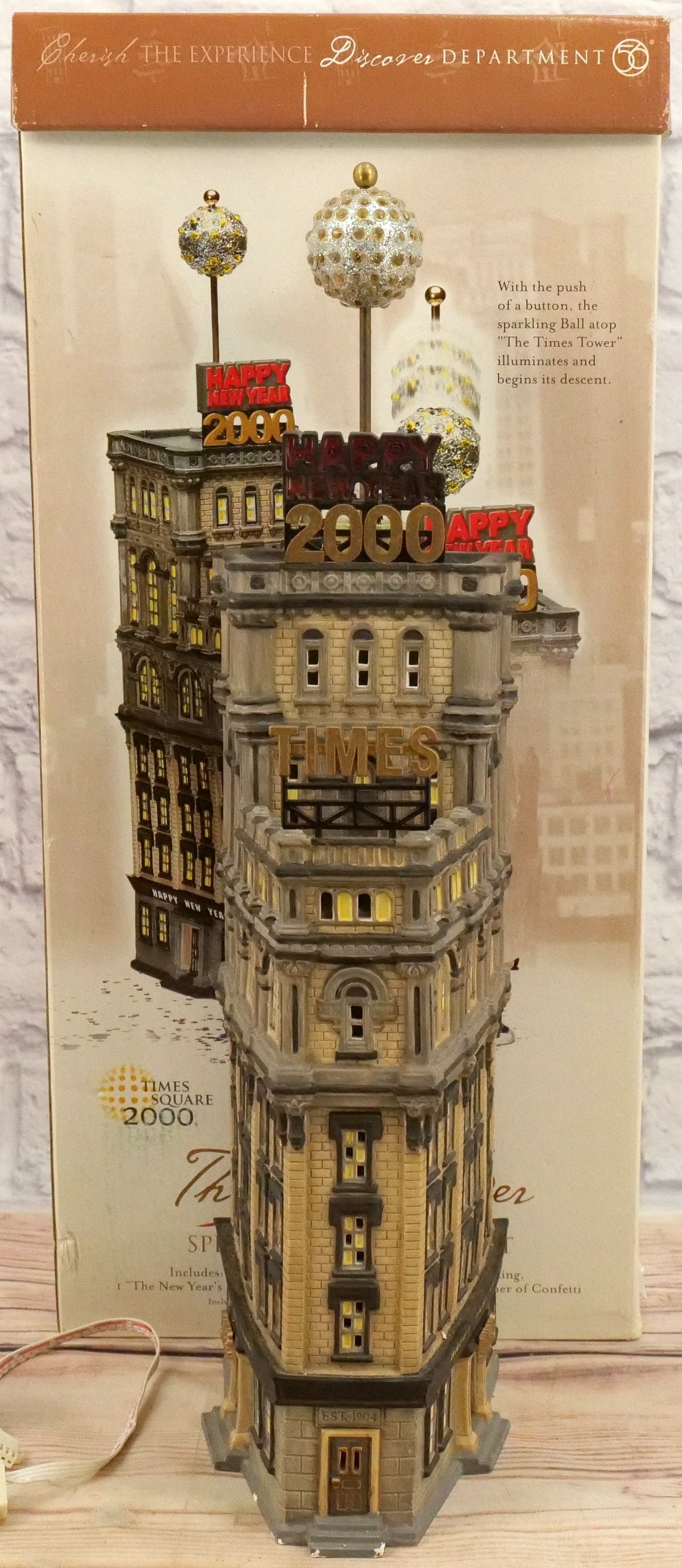 Dept. 56 Christmas in the City The Times Tower: Department 56 Christmas in the City - The Times Tower - Missing Accessories but the building appears to be in good condition. Comes with Light Cord. All Items in this sale have been on display and are