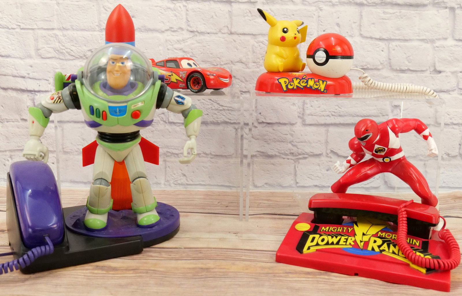 Lot of 4 Cartoon/Animation Themed Novelty Telephones: Lot of 4 Cartoon/Animation Themed Novelty Telephones including Buzz Lightyear, Lightning McQueen, PokÃ©mon, and Mighty Morphin Power Rangers. Largest measures 15.5" tall x 10.5" wide. This Collectio