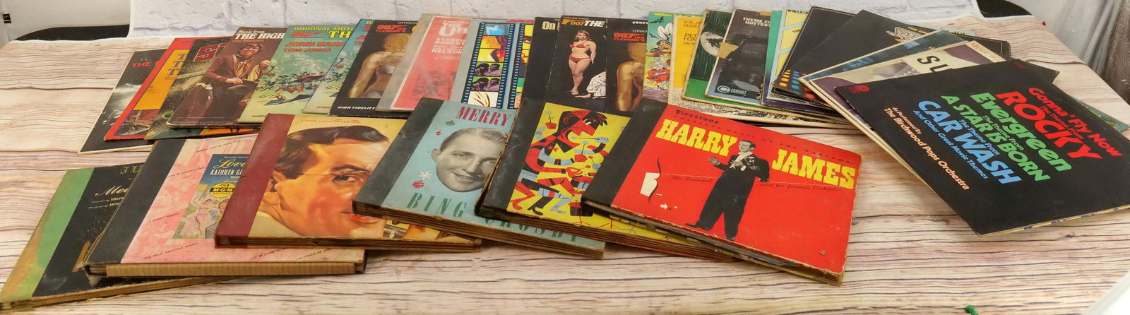 Lot of Records and 78's: Lot of Records and 78's including Superman, Miami Vice, James Bond Goldfinger, The Good Bad & The Ugly, Thunderball, Saturday Night Fever, The Green Hornet, and Much More. All invoices must be paid wi