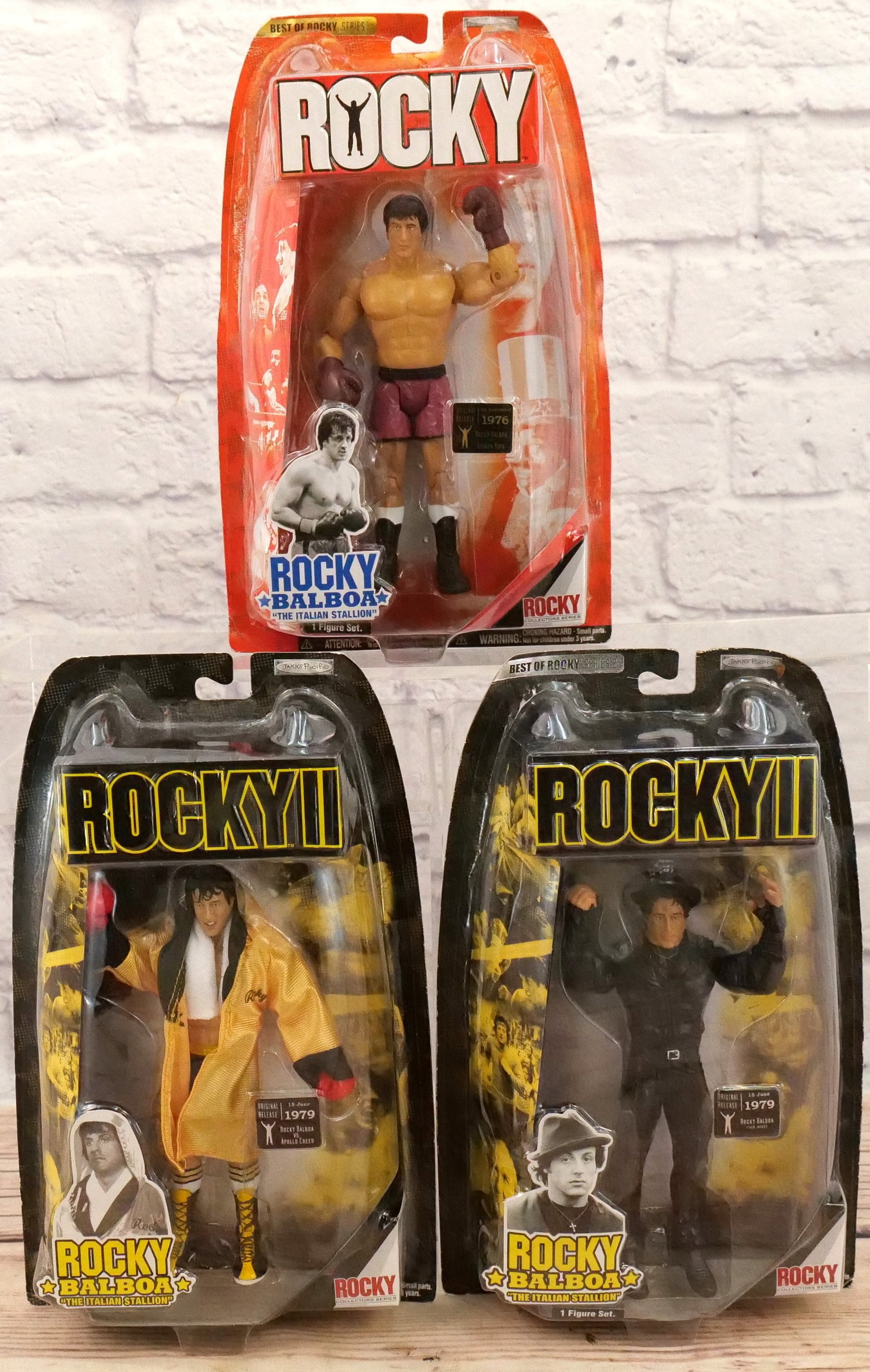 Lot of 3 Rocky Action Figures: Lot of 3 Rocky Action Figures including Rocky in Pink Shorts, Rocky II - Rocky in Gold Robe, and Rocky II - Rocky in Black Street Clothes Outfit. All invoices must be paid for within 24 hours. We offe