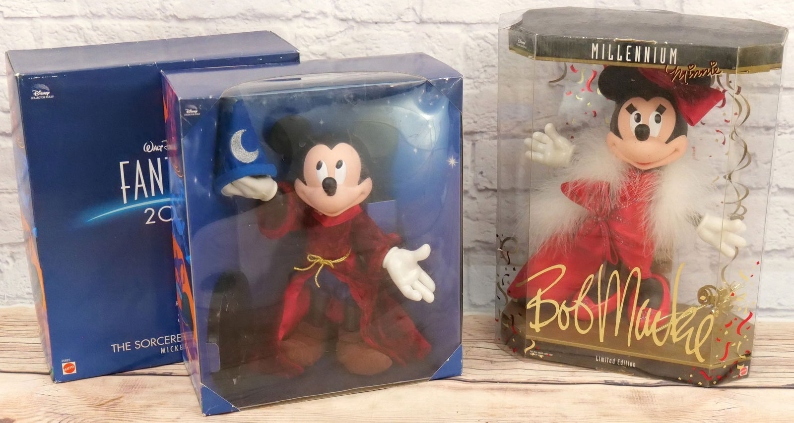 Lot of 2 Disney Millenium Dolls: Lot of 2 Disney Millenium Dolls including Bob Mackie Millenium Minnie and Fantasia Mickey Mouse 2000. Both are new in package. All invoices must be paid within 24 hours of the sale. We offer multiple