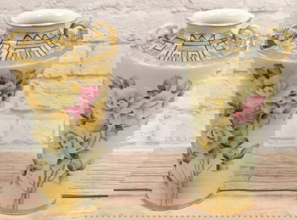 Pair of Hand Painted Nippon Double Handled Tall Vases: Pair of Hand Painted Nippon Double Handled Tall Vases with Rose and Flower Motif. Measures 12.5" tall x 7" wide. All invoices must be paid within 24 hours of the sale. We offer multiple shipping optio