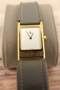 Ferrari by Cartier Tank Watch with Leather Band: Ferrari by Cartier Tank Watch with Leather Band. Stainless Steel Back Water Resistant - Serial No. 237019 Swiss Made. Measures 9" long. Inner band showing wear. All invoices must be paid within 24 hou