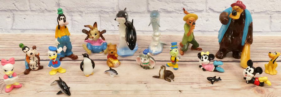 Group Lot of Ceramic Figurines: Group Lot of Ceramic Figurines including Disney Figures (Brer Bear, Brer Fox, Pooh, Dumbo, Goofy, Mickey, Minnie and More) and Ceramic Animals (Whales, Dolphins, Seal and More). Some paint loss presen